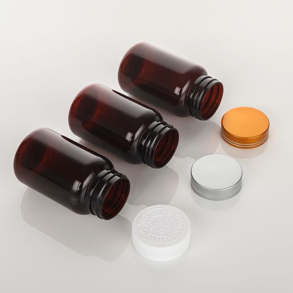 Highly Customized Luxury Black Frost Pill Bottle Capsule Bottle Green Plastic Vitamin Medicine Bottle Personal Care Packaging With Screw Cap