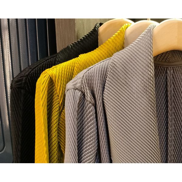 Spring 2025 Women's Solid Color Lapel Long Sleeved Pleated Women's Long Coat