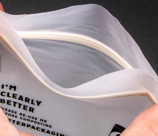 Biodegradable d matte k OEM waterproof bag zipper compostable zip packing bag for clothing apparel packing