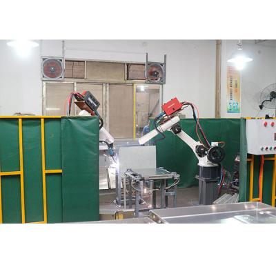 Auto Motoman com o braço robótico industrial