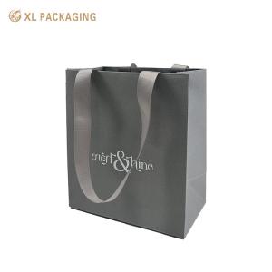 Luxury Gray Paper Gift Bag with Custom Logo, Textured Heavy-Duty Cardstock and Ribbed Fabric Handles for Boutique Packaging