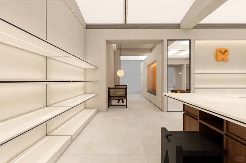 ream Arch Minimal Women Clothing Store Interior Design | Warm Neutral Ladies Garment Full Shop Layout
