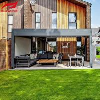 Pergola de aluminio motorizado gris para instalación en pared en piscinas y diseño de jardines