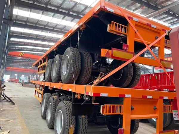 Jost E100 Landing Gear 4 Axle Flatbed Semi Trailer Truck for Heavy Duty Transportation