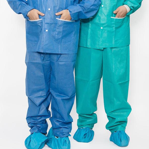 Disponível não tecido Scrub Traje superior e calças para hospital Traje médico enfermeiro T-shirt e calças de duas peças