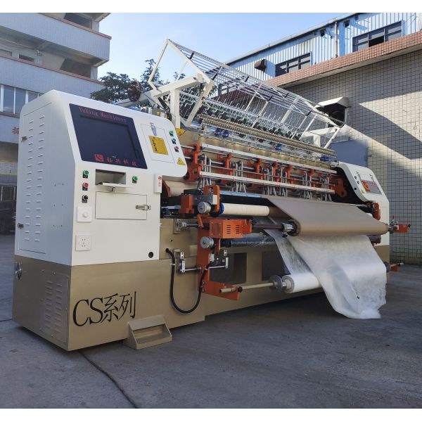 寝具は縫い、キルトにする機械2.45mキルトにする幅をコンピュータ化した