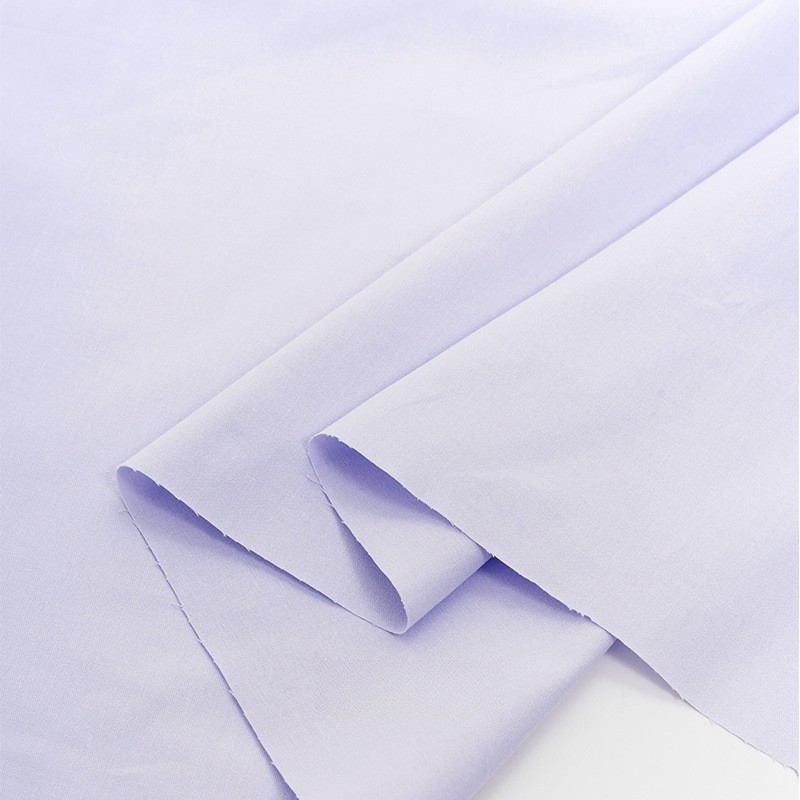 This 100% Polyester Poplin is made from 75D × 75D yarns at 110 GSM and woven in a high-density construction
