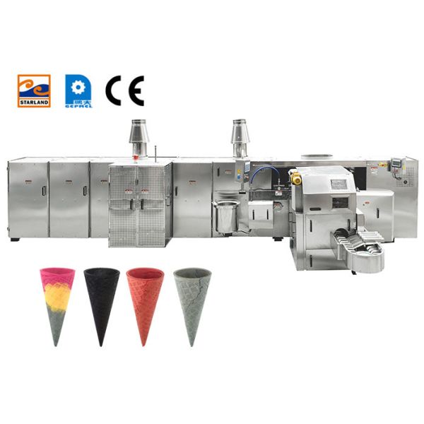 機械に101の焼ける版をする商業転がされた砂糖の円錐形