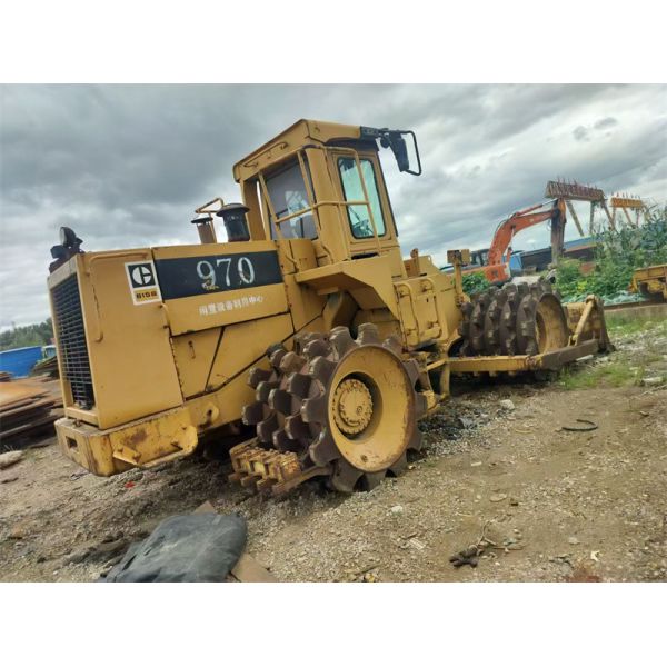 Used Caterpillar Industrial Garbage Compactor Truck CAT 815B Landfill Compactor
