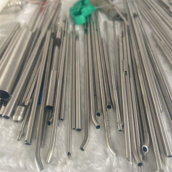 Customized processing of sandblasting scale for stainless steel capillary slotted flared reducing head.