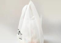 T-shirts en plastique blanc Sacs de magasinage
