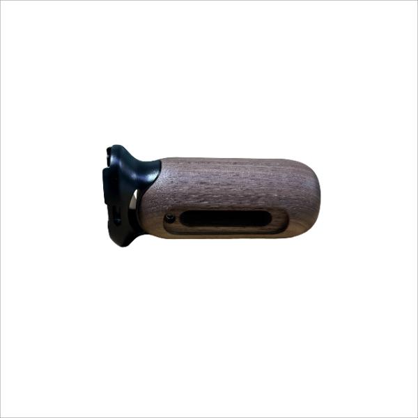 Wooden camera side grips are used in cage systems for mirrorless or SLR cameras as an auxiliary holding accessory for handheld
