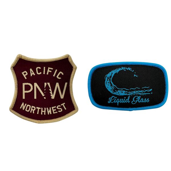 Изготовленный на заказ логотип фирменного наименования латает утюг на заплатах с голубой границей Merrowed