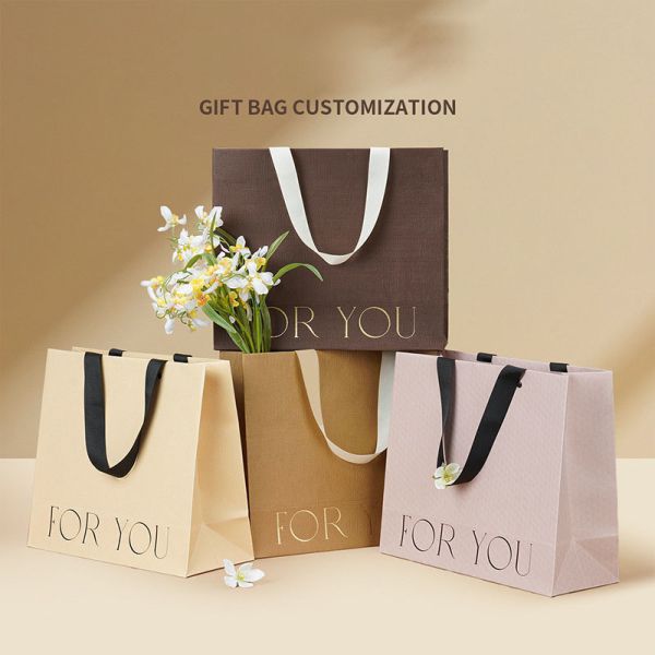Spot UV Shopping Paper Bags Hot Stamping CMYK Custom Kraft Bags With Logo