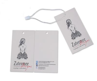 O costume imprimiu o balanço personalizado do papel da roupa da página central etiqueta o fornecedor