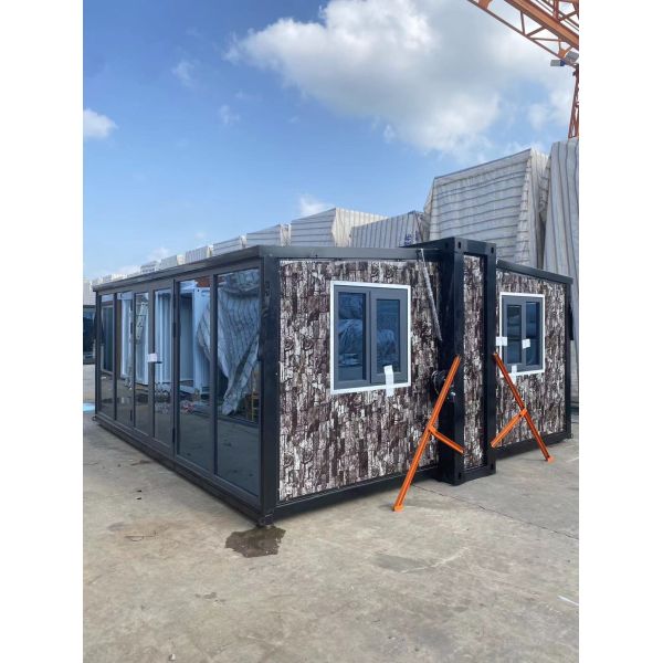 Expandable Prefab Homes with 12KW Power Consumption 2 KN/m² Floor Load Capacity and 1.95 Tons Net Weight
