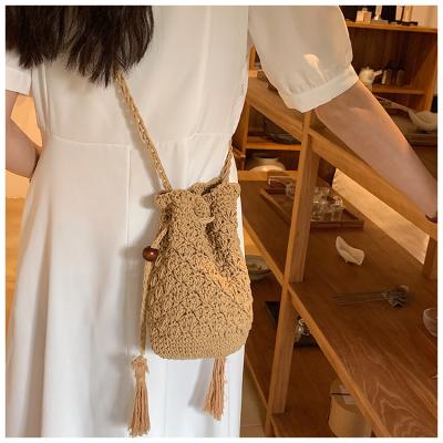 Raffia Paper Rope Crochet Straw Bag for Seaside Vacation Trips Shopping Handmade Large Crocheted Raffia Straw Tote Bag With Stone Closure OEM Bohemian Leather Fashion Women Vintage Casual