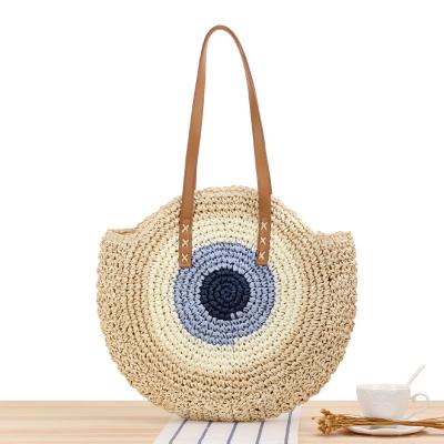 A praia tecida vintage das bolsas do verão ensaca a mala a tiracolo feito a mão redonda