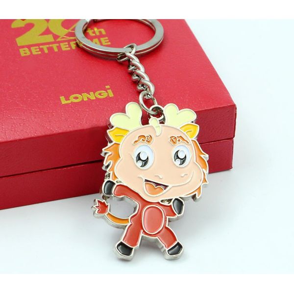 Zinc alloy paint enamel metal fish plane girls key chain cartoon character pendant creative small Yiwu gift