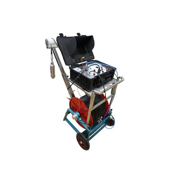 Integrated borehole focus adjusting orbit cam borehole inspection camera system