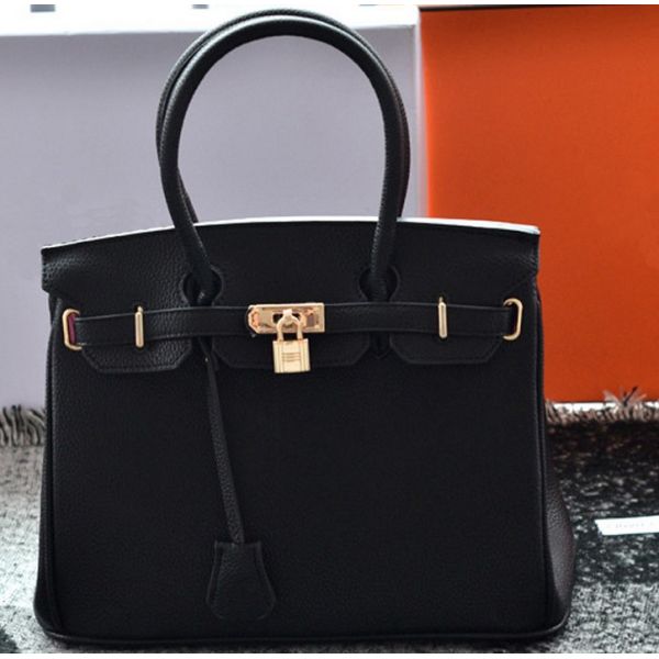 2015 new wave of European and American female autumn and winter fashion embossed handbag shoulder bag woman