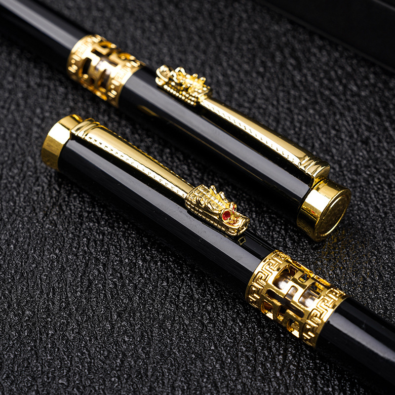 El estilo chino de papel de escritorio de negocios de metal conjunto hueco fuera de la cabeza del dragón bolígrafo de rodillo