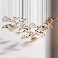 Le lustre en verre du hall de l'hôtel crée des lustres suspendus pour le salon et la salle à manger de la villa