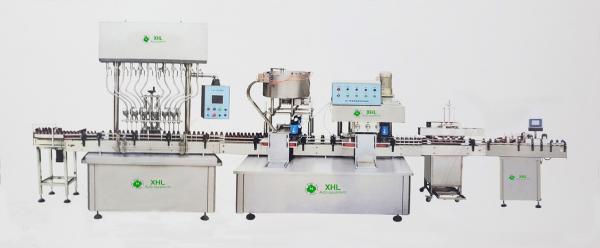 XHL-AGF Corrosive Liquid Products Bottle Turntable,Gravity Filling,Capping,Induction Sealing,Labeling Production Line