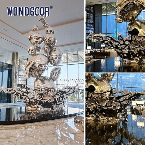 Большая кованая металлическая скульптура Капли воды и брызги в гостиничном фойе