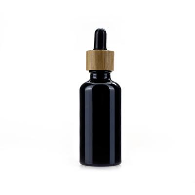 Garrafas de vidro pretas cosméticas do conta-gotas 50ml personalizadas para o óleo essencial