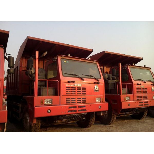 Unloading Dump Truck 371 hp driver 6x4 mining dump truck / tipper truck howo brand