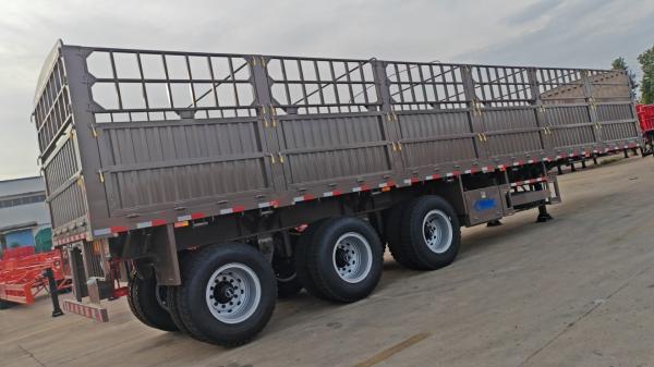 CIMC iron material 3 axles 40-80 Tons Capacity Stake Type Heavy cargo van type High Fence Warehouse Semi truck trailer