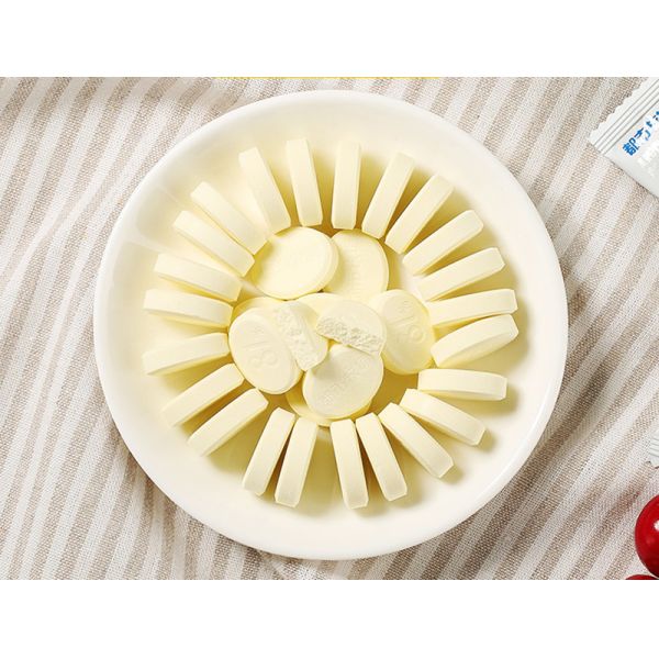 Не конфета молока сливочника молокозавода требующая усиленного жевания с портативной упаковкой саше