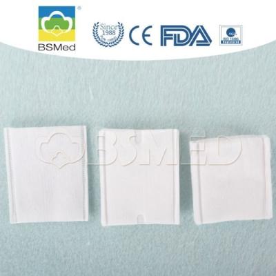 O algodão cosmético dos cuidados pessoais da pele acolchoa 0,4 - o quadrado 0.6g dá forma à cor branca
