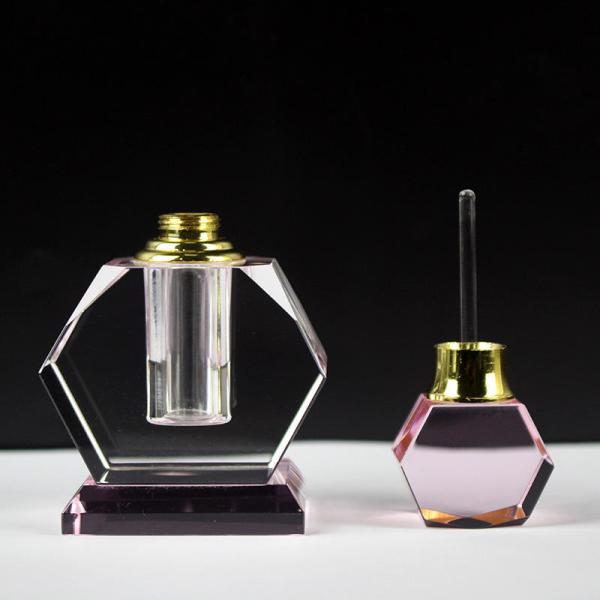 Botella de perfume de cristal rosa de 6 ml con diseño grabado