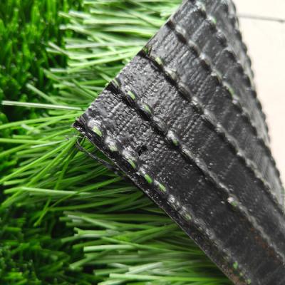 Césped artificial de fútbol personalizable 12000 Dtex Bajo mantenimiento para mascotas Parque de juegos y deportes al aire libre