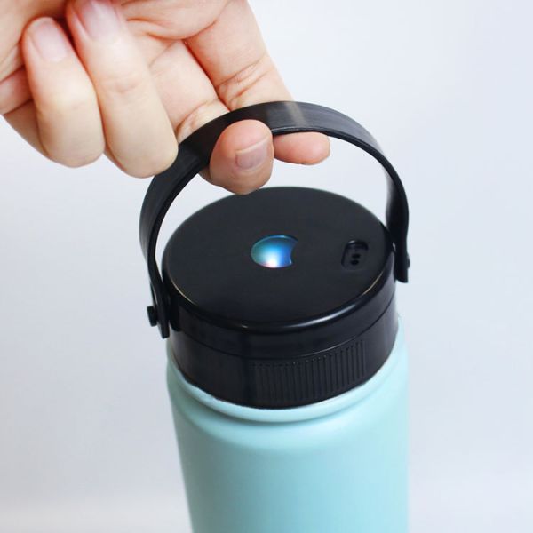 Bouteilles d'eau d'entraînement isolées à large ouverture en acier inoxydable avec stérilisation UV, couleur grise, poignée de transport et volume personnalisé de 500 ml, parfaites pour les sports de plein air