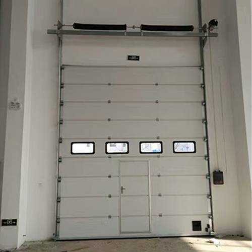 24dB Insulated Custom Vertical-Lift Industrial Sectional Overhead Door For Facility Applications