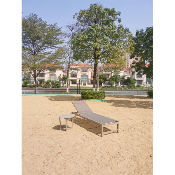 Upgrade Your Beach and Pool Experience with this Metal Outdoor Patio Wave Chaise Lounger