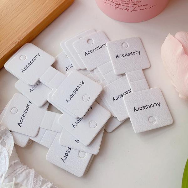 Tarjetas plegables para coleteros en relieve, texto negro, 100 unidades