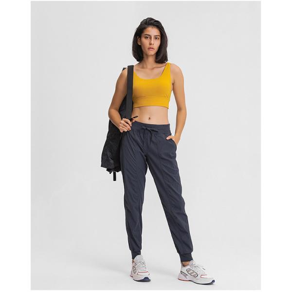 Fashion Woven Fabric Women's Loose Fit Pocket Yoga Pants For Autumn Winter