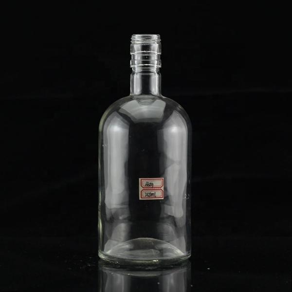 Industrial 700ml Glass Bottle for Beverage Industry in Thumb Shape