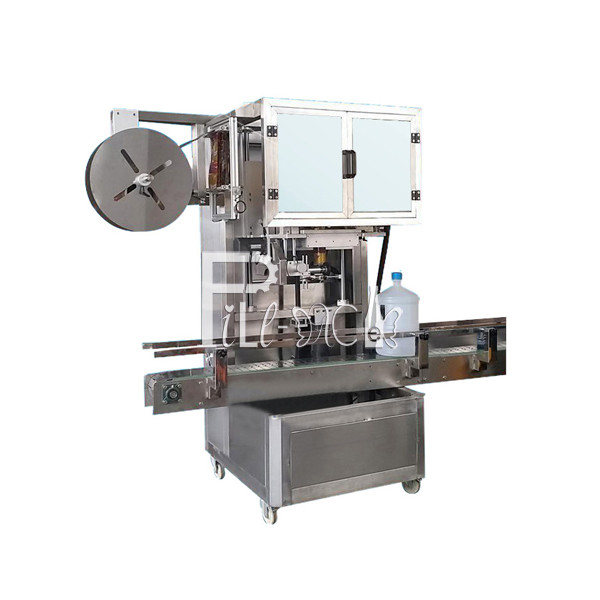 Un étiqueteur principal électrique de bouteille ronde de douille de chapeau