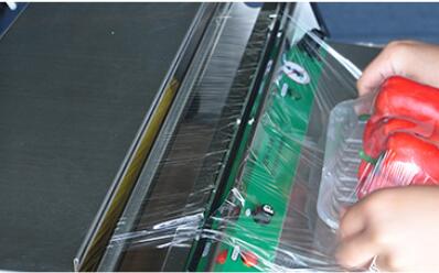 ПВК нержавеющей стали электрический льнет машина для упаковки фильма/машина запечатывания подноса еды