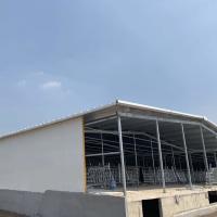 Cuadro prefabricado personalizable Estructura de acero Resistencia al fuego Panel de sándwich de lana de roca Almacén