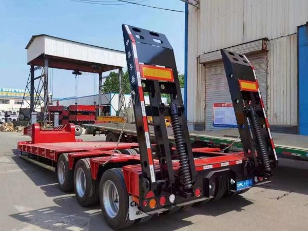 Steel Or Aluminum Tri-axle 40/45/50/60 Tons Heavy-duty Transport Vehicle Low Flatbed Semi Trailer