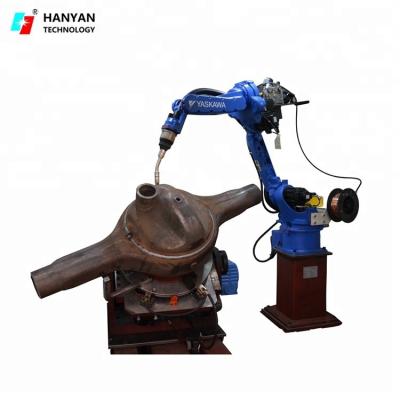 Station de travail de robot de soudage de 3000 kg pour le couvercle arrière du boîtier de l'essieu/bras du robot industriel