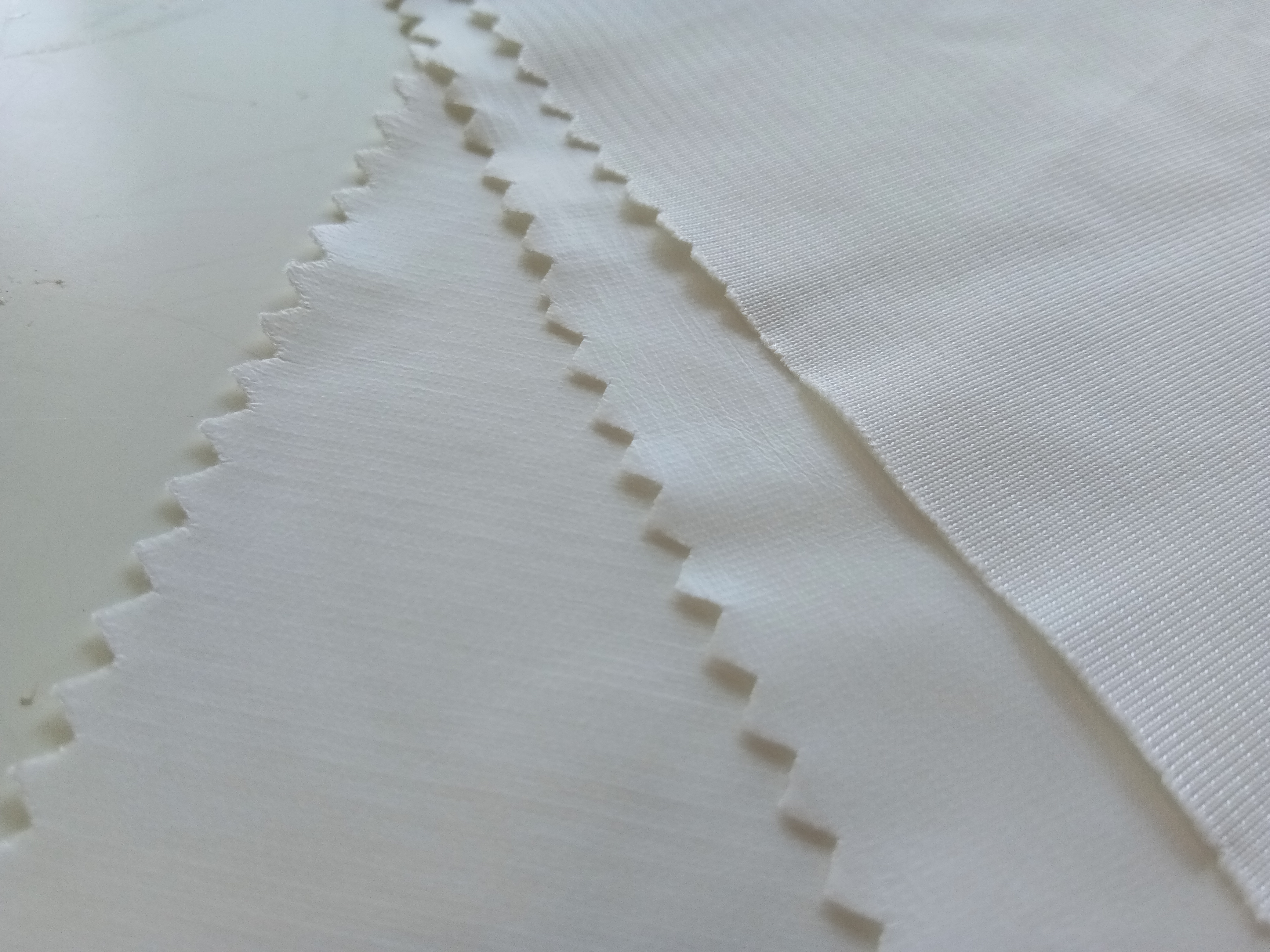White 100% Nylon Knit Fabric Laminated Mattress Protector Fabric Abrasion Resistance