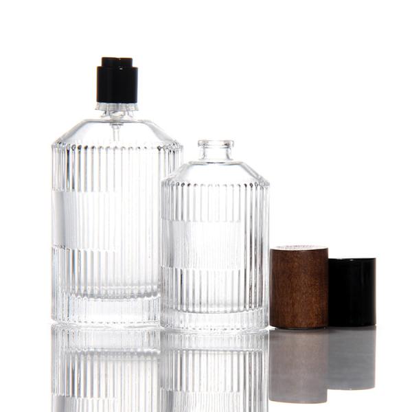 Garrafa de perfume transparente de cilindro OEM Garrafa de perfume de vidro de 50 ml com caixa de presente Pulverizador de bomba
