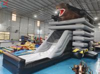 Nouveau design de château gonflable avec diapositive sur le thème du dinosaure commercial